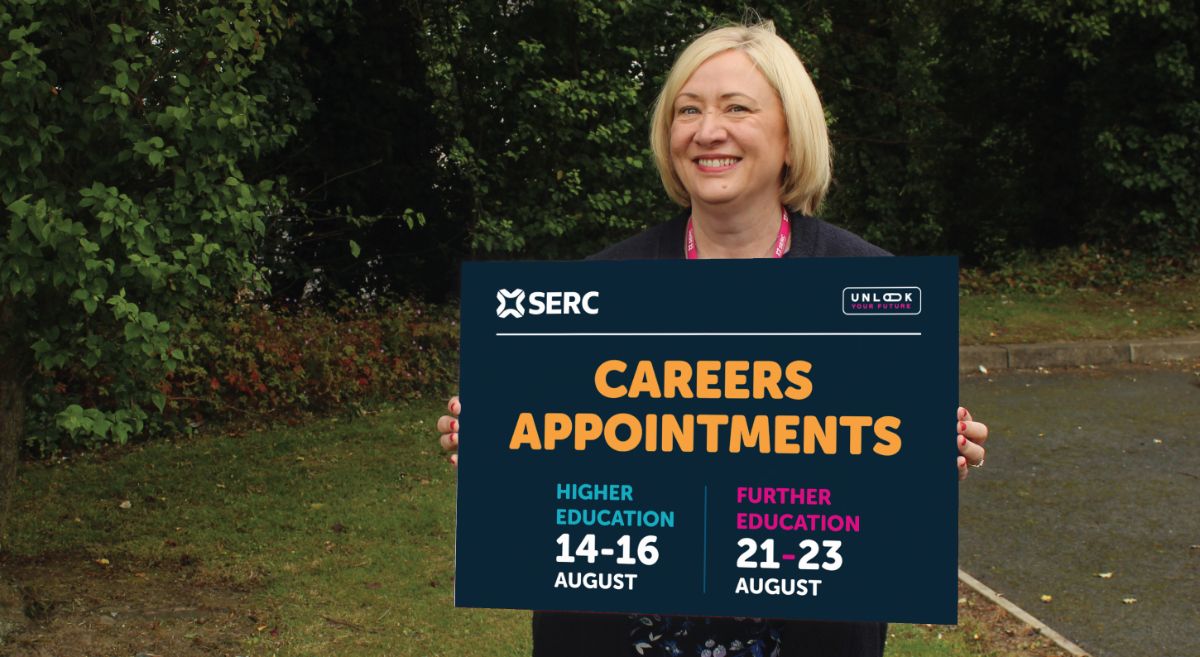 Careers advisor Anne Reid - female with blonde hair, holding a notice board, pictured outside - will be on hand at Newtownards Campus.